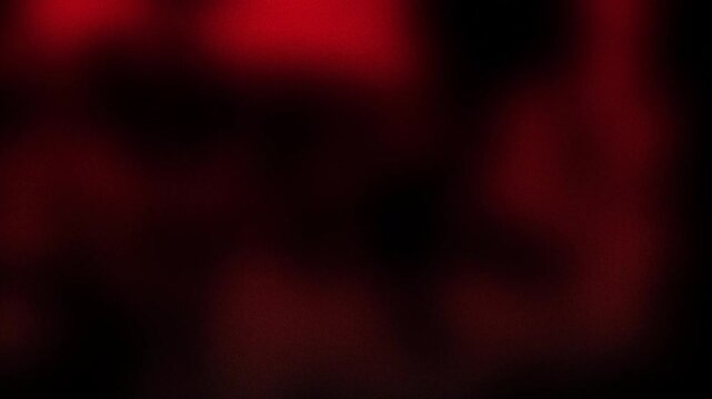 Abstract red bokeh background with soft blurred light gradient smooth texture deep glow and dramatic cinematic atmosphere perfect for modern digital design wallpaper creative backdrop and bold present
