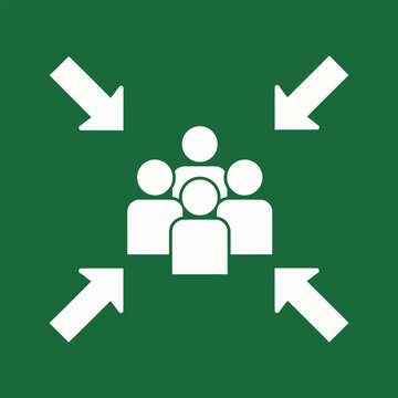 Emergency assembly point sign with five white stylized people icons and four inward-pointing arrows on a green background.