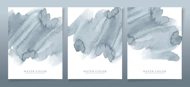 Subtle collection of three vertical watercolor abstract banners featuring soft, cool gray-blue brushstrokes on clean white backgrounds for design.