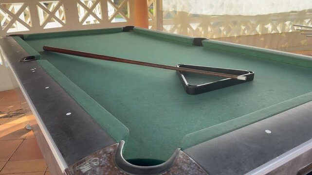  Snooker billiard table, cue on the table, playroom