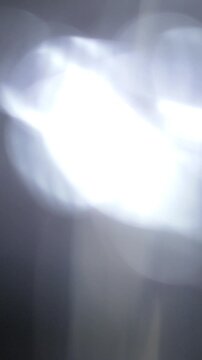 Soft Vertical Flashing Light Bokeh Transition, Abstract light gradient video with soft glow and motion. ideal for instagram story