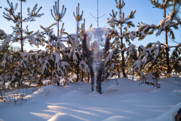 Little Girl Exploring Snow During Winter Walk