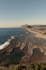Obraz premium Stunning mountain, waterfall, sea views, and sunset photos.