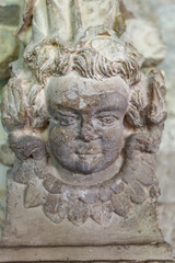 Angel face inside fhe Notre Dame de Nazareth cathedral in Vaison-la-Romaine, Vaucluse, France, Europe