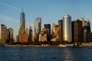 Fototapeta premium New York City Skyline at Golden Hour with Warm Sunset Light