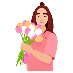 A cute young woman holds a bouquet of tulips in her hands for Mother's Day