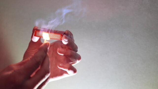 Close-up of Match Striking on Box with Original Friction and Sizzling Sound