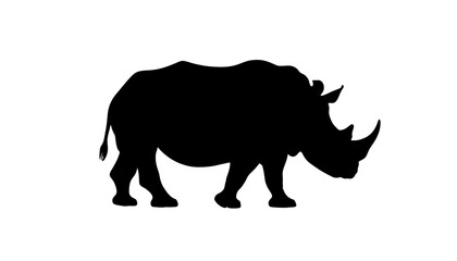 Fototapeta na wymiar Black silhouette of a rhinoceros, depicted in profile. The large mammal has a horn and thick skin