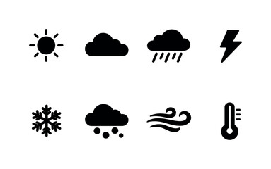 Weather conditions. Filled icon set of Weather conditions: sunny sky, cloudy sky, heavy rain, lightning bolt, snowfall,