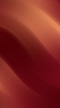 Abstract flowing waves of deep red and golden orange colors.