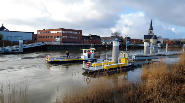 Veer Schellebelle, a charming pedestrian and cyclist ferry that crosses the Scheldt (Schelde) river in the village of Schellebelle, Belgium
