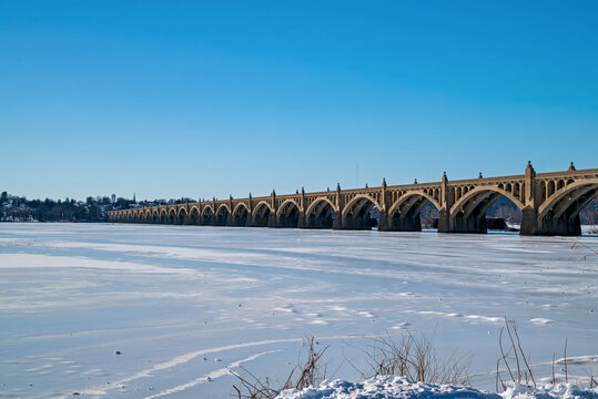 Bridge spanning the frozen Susquehanna River. It is the longest river on the East Coast of the United States that drains into the Atlantic Ocean, via the Chesapeake Bay.  