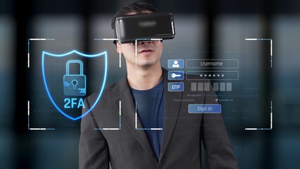 A man stands in a modern office environment wearing a virtual reality headset, interacting with a digital interface displaying two-factor authentication features. Raster © InfiniteFlow