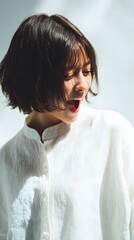 A young woman with a surprised expression.