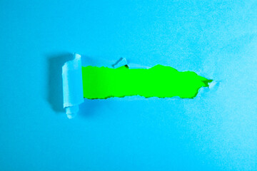 Torn paper with space for your message on the blue background.