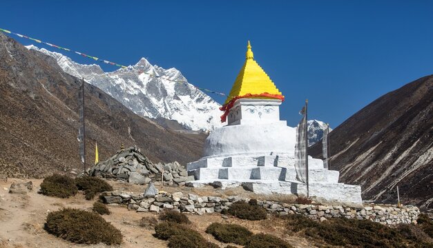 Stupa prayer flags mount Lhotse Nepal himalaya mountain