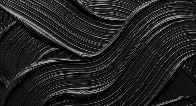 Close up black thick paint strokes with glossy texture creating smooth sweeping curves and dynamic flowing patterns in high contrast lighting