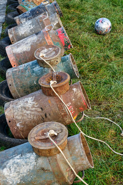 Old milk cans in a row. Carbide shooting or carbidschieten in dutch is a tradition in the Netherlands and usually takes place on New Year's Eve. The goal is to make a loud bang after the carbide	