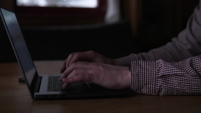 Man Planning Business. Caucasian Male Designing Detailed Business Plan At His Computer. Man Dressed In Checkered Shirt Actively Developing And Reviewing Corporate Proposal On His Device