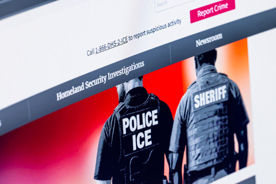 closeup view of computer screen with United States ICE web site and phone number to report crime in Balykchy, Kyrgyzstan - February 13, 2026