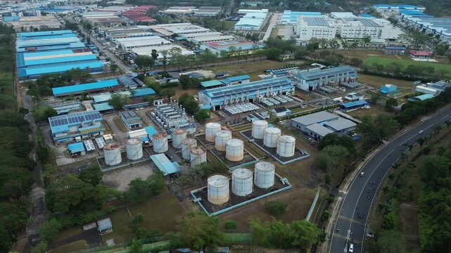 Aerial panorama reveals a sprawling industrial zone with integrated manufacturing, and processing