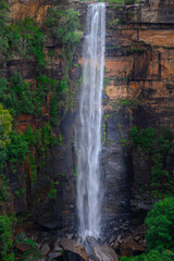 Obraz premium Mountains and Beautiful flowing River in Fitzroy water Falls in Bowral NSW Australia beautiful colourful cloudy skies lovely waterfalls