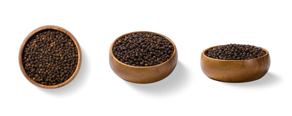 Three piles of mixed black peppercorn in a wooden bowls, shown from top and side views, isolated on...