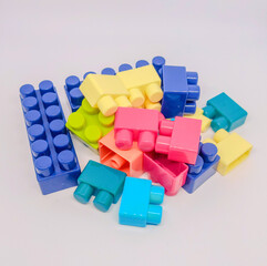 colorful plastic toy blocks © Adam