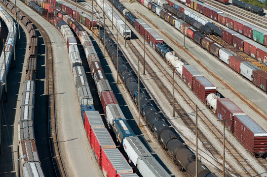 Canada, BC, Surrey.  CN Rail yard beneath the Port Mann Bridge.
