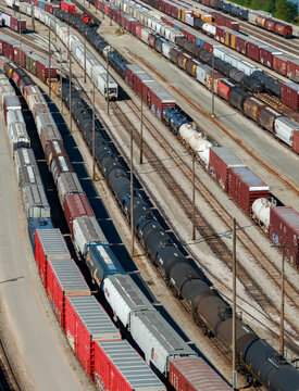 Canada, BC, Surrey.  CN Rail yard beneath the Port Mann Bridge.