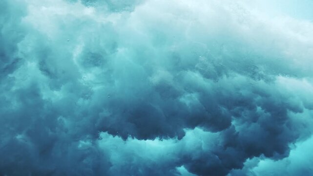Turbulent underwater wave cloud with swirling foam and deep ocean blue tones