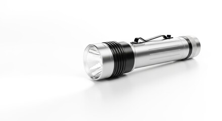 Close-up of a silver flashlight on a white background.