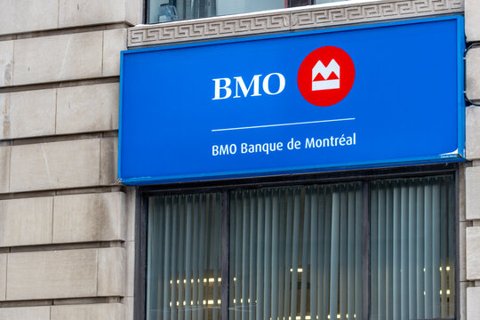 MONTREAL, CANADA, 25 December 2025 : Bank of Montreal sign urban building exterior storefront logo Canada
