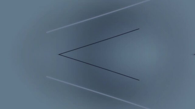 Motion blur captures abstract lines on a gray background with geometric shapes in motion.
