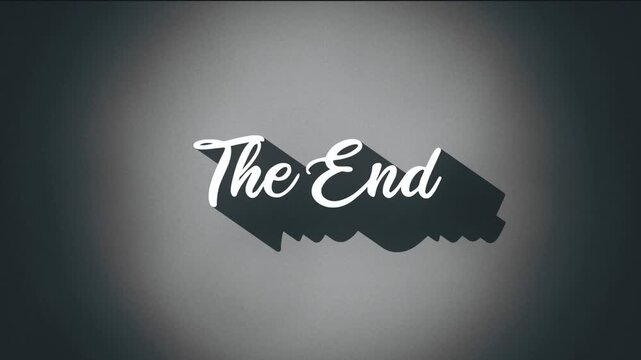 The end movie title screen with white text on black silhouette and gray gradient background