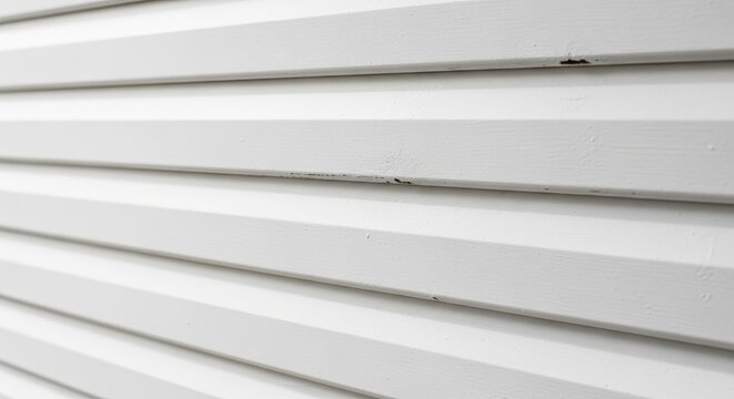 Close-up of White Vinyl Siding with Horizontal Lines.