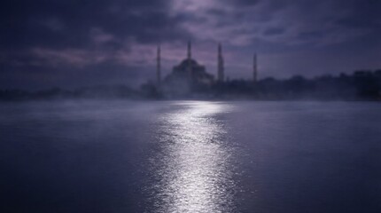 Dramatic Night Shot of Building with Minarets Reflected in Water with Moonlight