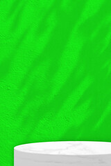 White marble style pedestal placed against a bright green background with soft, dappled lighting shadows.