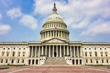 Obraz premium Exterior view of the US Capitol, home of the US Congress with its iconic dome and historic architecture,eastern end of the National Mall in Washington DC,US