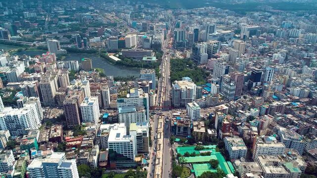 Wide Aerial Drone View of Dhaka City Skyline Showcasing Dense Urban Development, Banani Lake, and Ongoing Metro Rail Infrastructure Project in Bangladesh