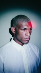 Thoughtful Mixed Race Man Concentrating in Close Up Profile Portrait for Creative Branding and Professional Identity with Soft Studio Light and Copy Space