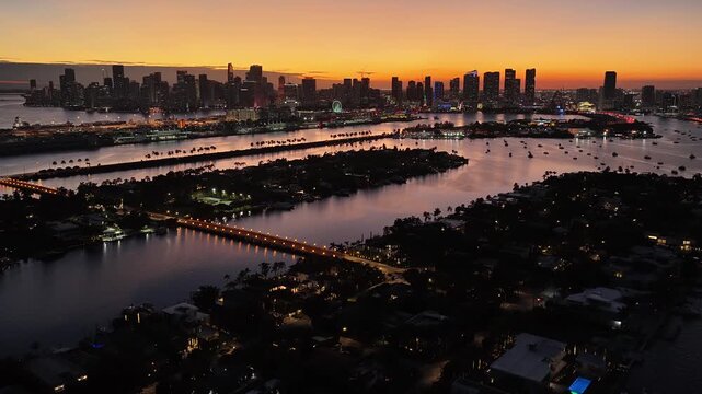Sunset City At Miami Beach In Florida United States. Sunset City. Illuminated Cityscape. Downtown District. Sunset City At Miami Beach In Florida United States. Peaceful Sunset Sky.