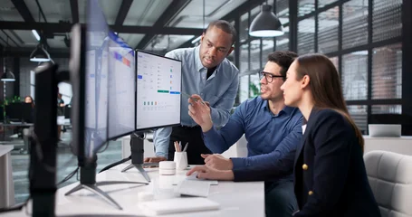 Selbstklebende Fototapeten Altes Krankenhaus Beelitz Modern Office Setting Features Diverse Team  © Andrey Popov