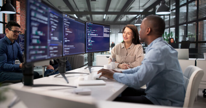 African American Software Engineer Leading Diverse Team