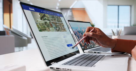 Black Woman Using Laptop To Book Vacation