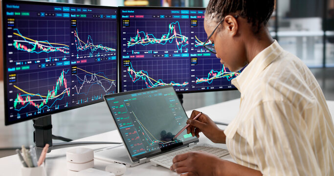 Professional African Woman Analyzing Stock Exchange