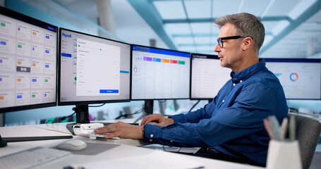 Man Using Automatic Salary Calculation Software