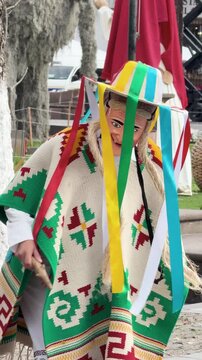 Dancers perform Danza de los Viejitos in traditional costumes and masks in Patzcuaro, Michoacan. Perfect for travel documentaries and cultural heritage content