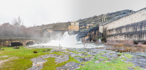 Fototapeta premium Water release, due to heavy rains, from the Ponton de la Oliva dam in Madrid
