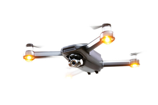 A sleek gray drone with glowing orange lights flying isolated on transparent background
